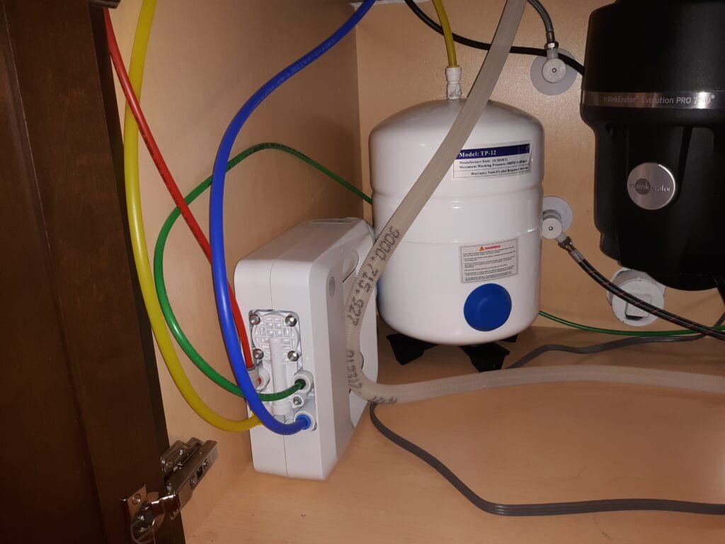 Under-sink reverse osmosis water filtration system and connections